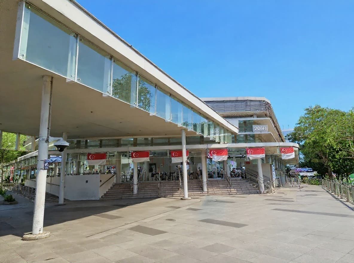 Entrance plaza and glass canopy of Bedok Interchange Hawker Centre in Bedok Central