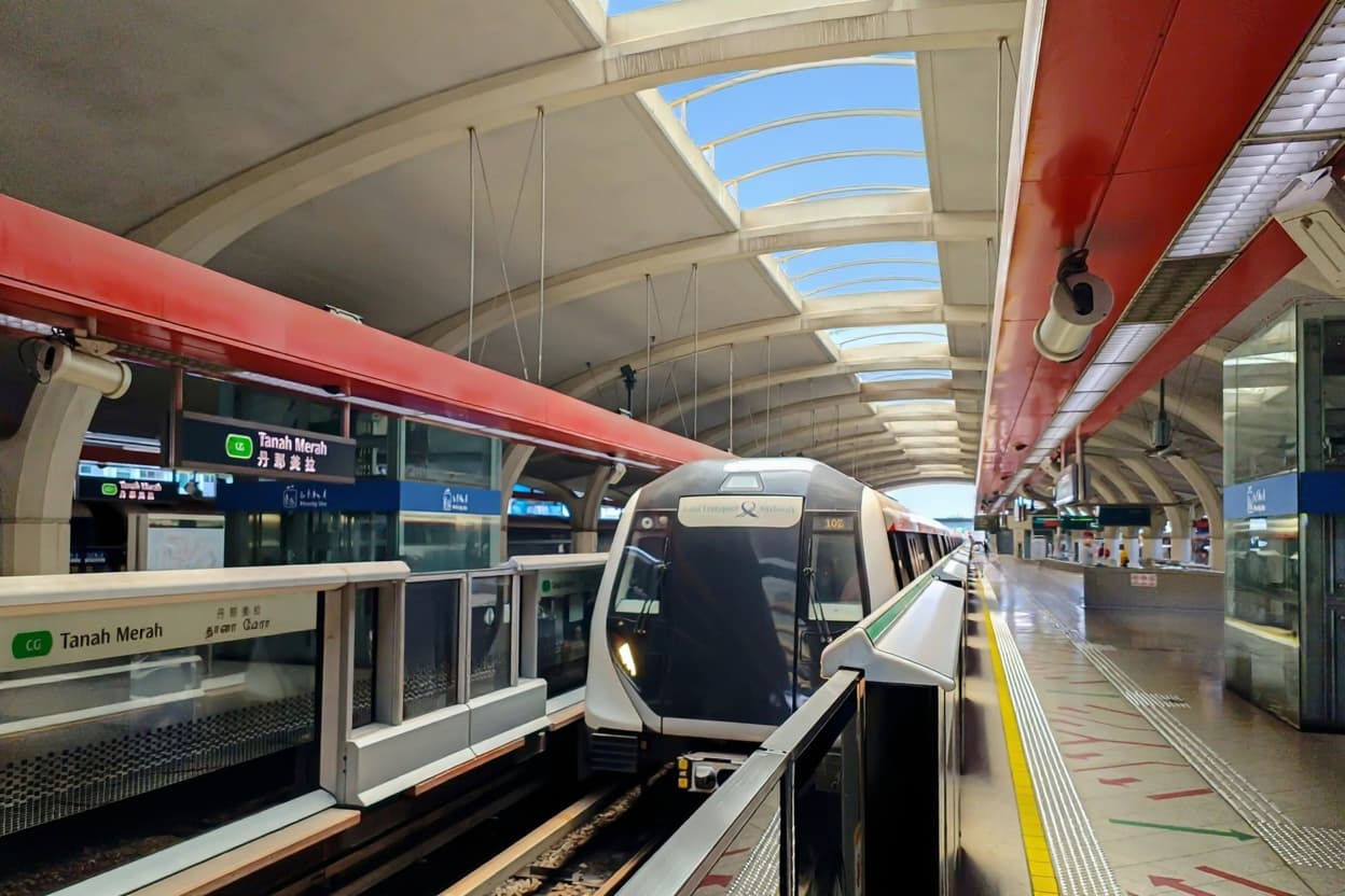 Train at the platform of Tanah Merah MRT station on the East-West Line, the station the Bedok Rise Residences site fronts